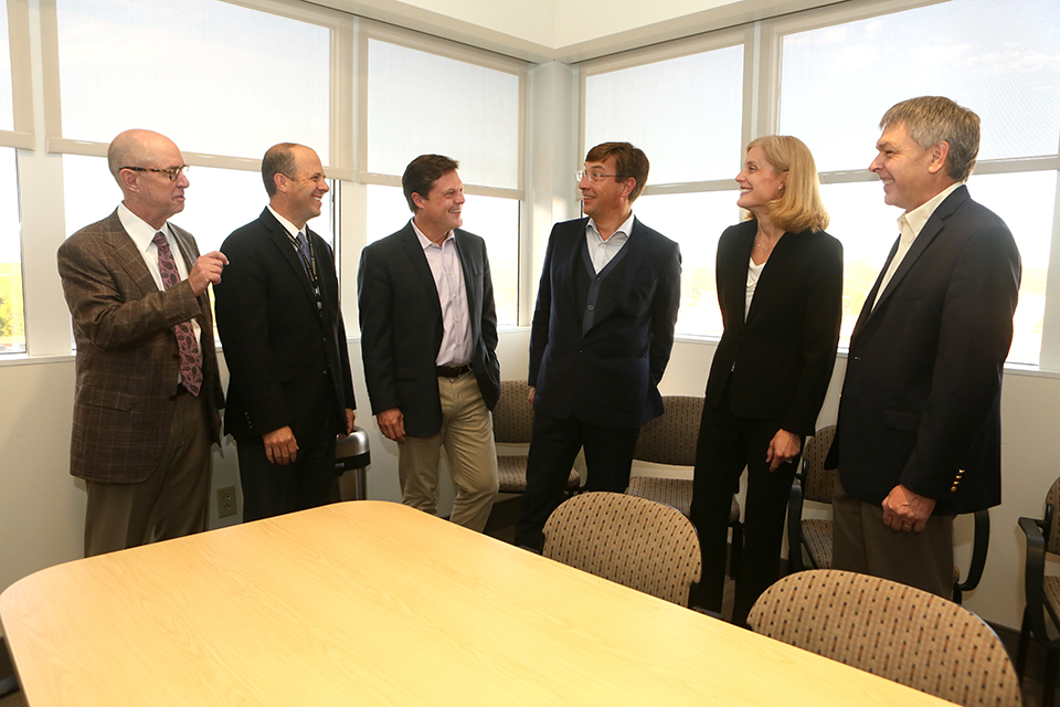 Dr. Savona with other cancer researchers and VUMC leadership
