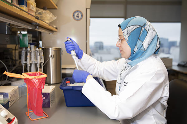 Dr. Gohar doing bench research in her lab