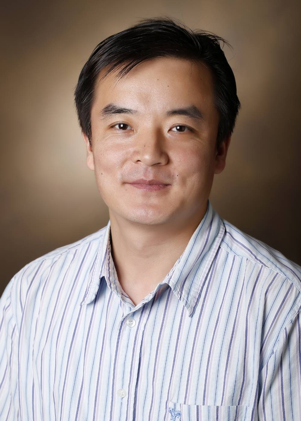 Yaomin Xu, Ph.D.
